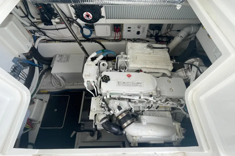 Lady Faye Yacht Photos Pics Engine room of 2018 Viking 37 Billfish with Cummins engine, showcasing detailed components.