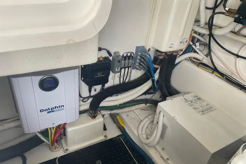 Lady Faye Yacht Photos Pics Electrical system setup in a 2018 Viking 37 Billfish boat, featuring Dolphin Pro charger.