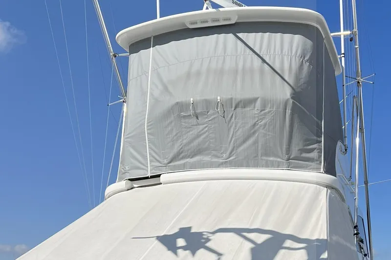 Lady Faye Yacht Photos Pics 2018 Viking 37 Billfish boat with covered flybridge against clear blue sky.