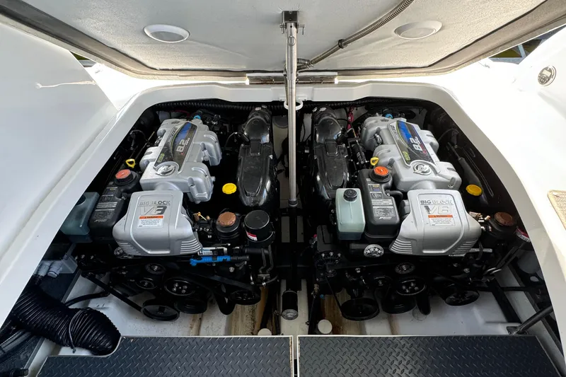  Yacht Photos Pics Twin engines in a 2020 Formula 370 SS boat, showcasing powerful marine engineering.