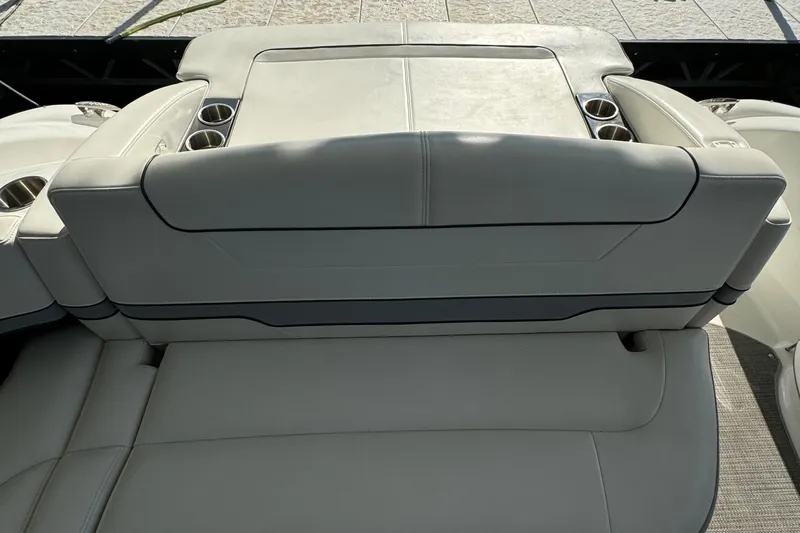  Yacht Photos Pics 2020 Formula 370 SS boat interior with white leather seating and cup holders.