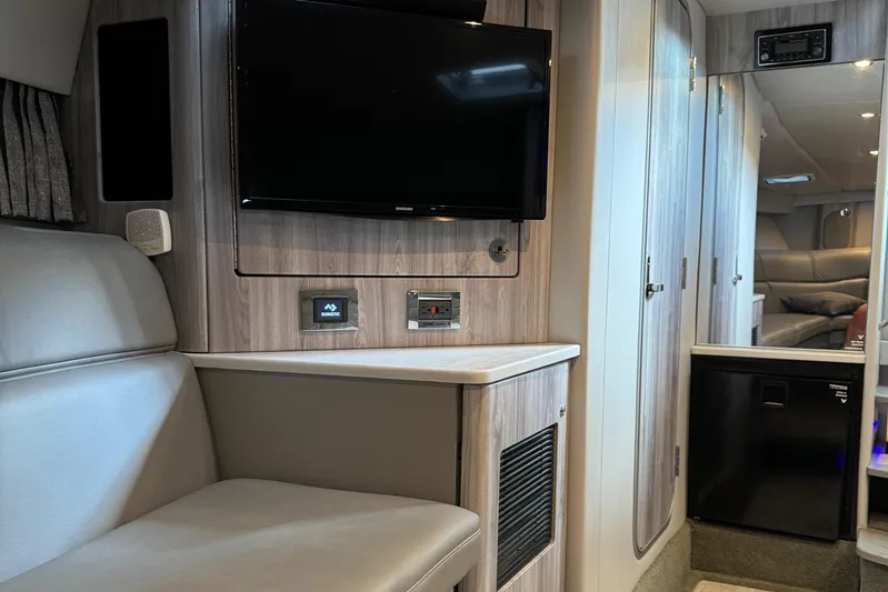  Yacht Photos Pics Interior of 2020 Formula 370 SS boat with TV, seating, and modern cabinetry.