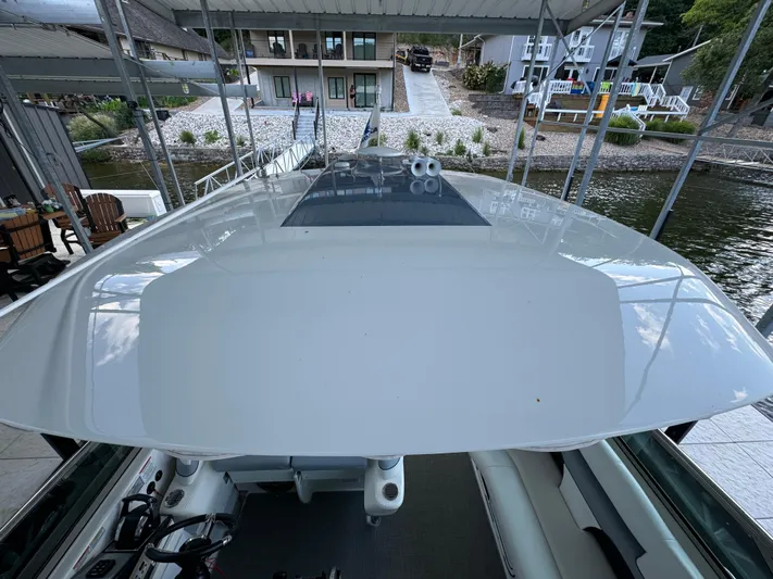  Yacht Photos Pics 2020 Formula 370 SS boat docked, showcasing sleek design and spacious deck.