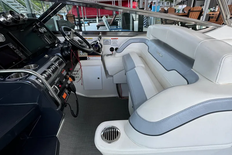  Yacht Photos Pics Interior of 2020 Formula 370 SS boat with white seating and modern dashboard.