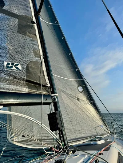 Sails Up Yacht Photos Pics Sailing on a 2022 Beneteau First 27 with clear skies and ocean view.