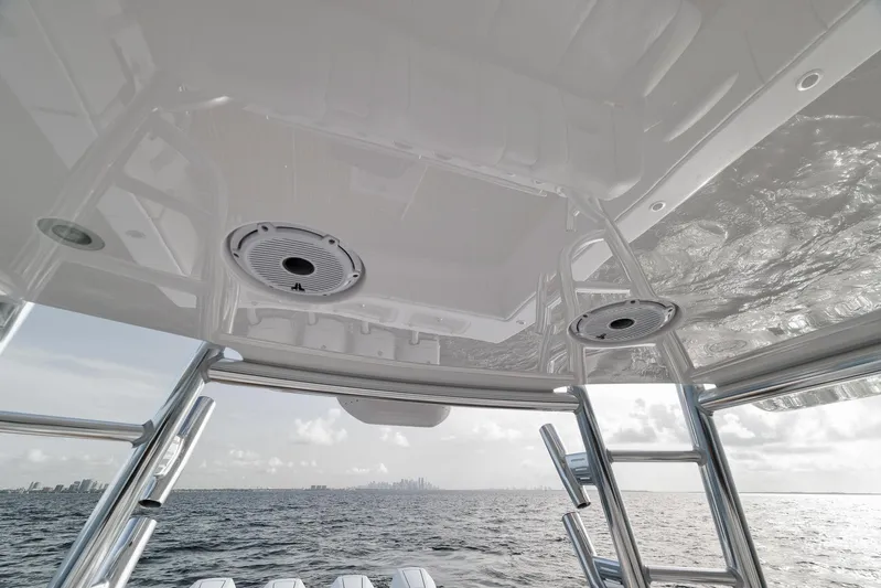  Yacht Photos Pics 2024 Contender 44 ST boat interior with ocean view and city skyline in the background.