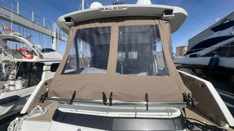 Yacht Photos Pics 2024 Galeon 410 HTC yacht with covered rear deck, docked at marina.
