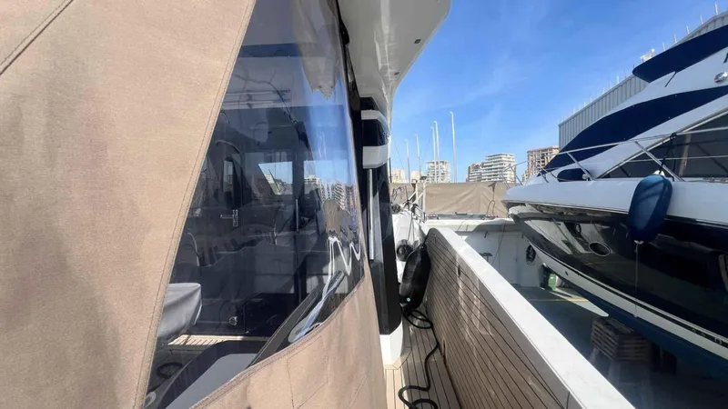  Yacht Photos Pics 2024 Galeon 410 HTC yacht docked, showcasing sleek design and modern features.