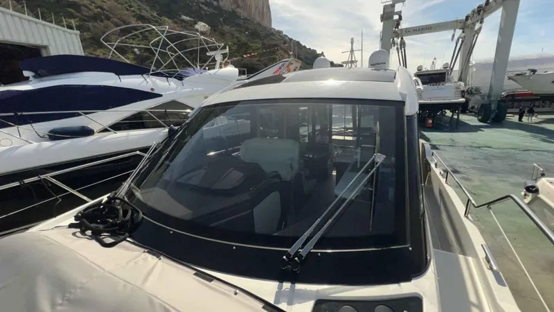  Yacht Photos Pics 2024 Galeon 410 HTC yacht docked, showcasing sleek design and modern features.