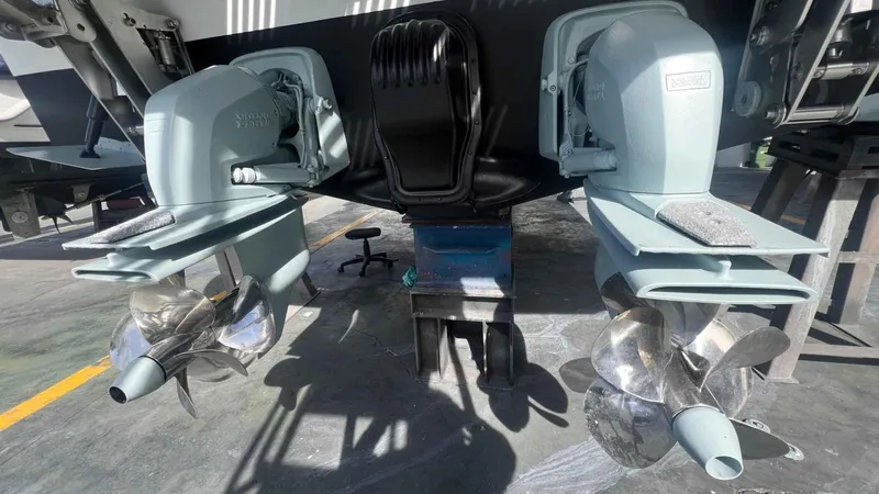  Yacht Photos Pics 2024 Galeon 410 HTC boat propellers and stern view in a maintenance area.