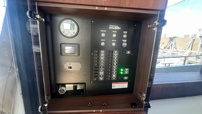  Yacht Photos Pics Electrical control panel on a 2024 Galeon 410 HTC yacht, featuring switches and gauges.