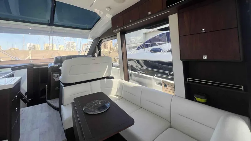  Yacht Photos Pics Luxurious interior of 2024 Galeon 410 HTC yacht with white seating and modern design.