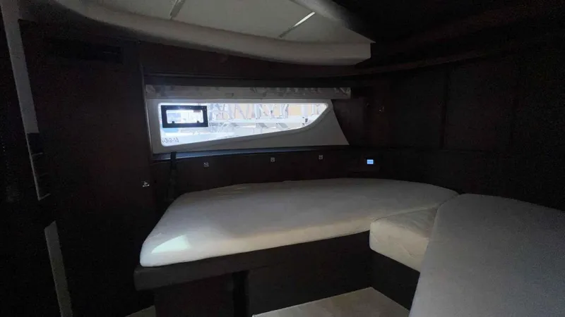  Yacht Photos Pics Luxurious interior cabin of 2024 Galeon 410 HTC yacht with modern design.