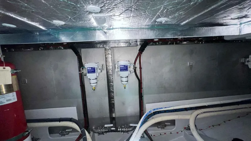  Yacht Photos Pics Engine room of 2024 Galeon 410 HTC yacht with visible piping and equipment.