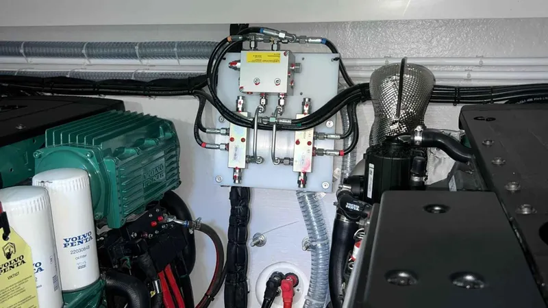  Yacht Photos Pics Engine room of 2024 Galeon 410 HTC yacht, featuring advanced mechanical components and wiring.