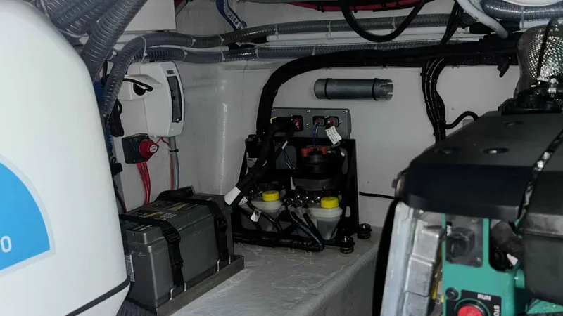  Yacht Photos Pics Engine room of 2024 Galeon 410 HTC yacht, featuring mechanical components and wiring.