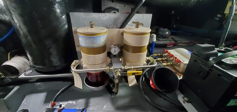 Callie B Yacht Photos Pics Engine room of 2001 Sea Ray 400 Sedan Bridge with dual fuel filters.