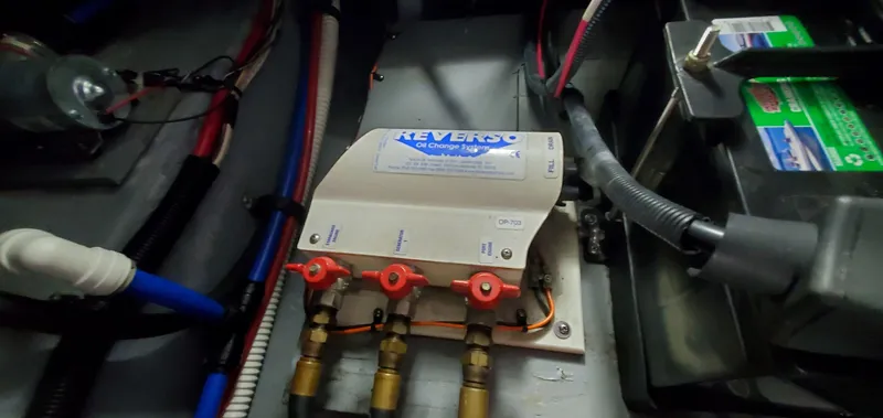 Callie B Yacht Photos Pics Engine compartment of 2001 Sea Ray 400 Sedan Bridge with Reverso oil change system.