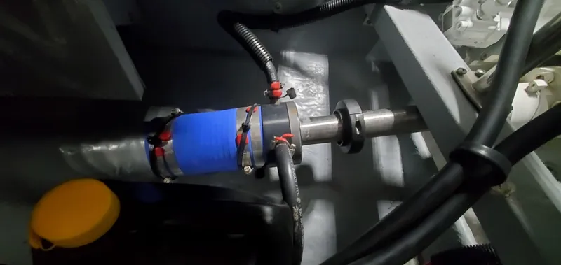 Callie B Yacht Photos Pics Engine room of 2001 Sea Ray 400 Sedan Bridge with visible shaft and components.