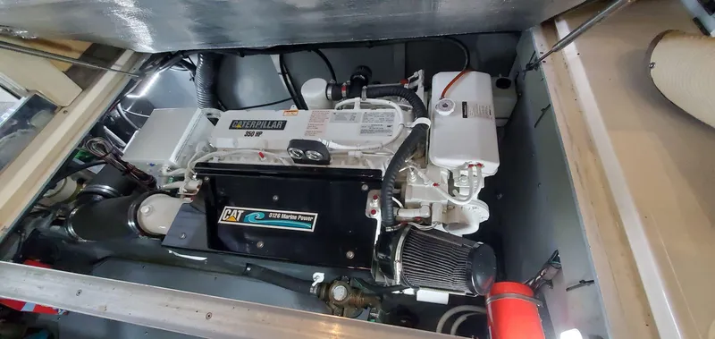 Callie B Yacht Photos Pics Engine compartment of 2001 Sea Ray 400 Sedan Bridge with Caterpillar engine.