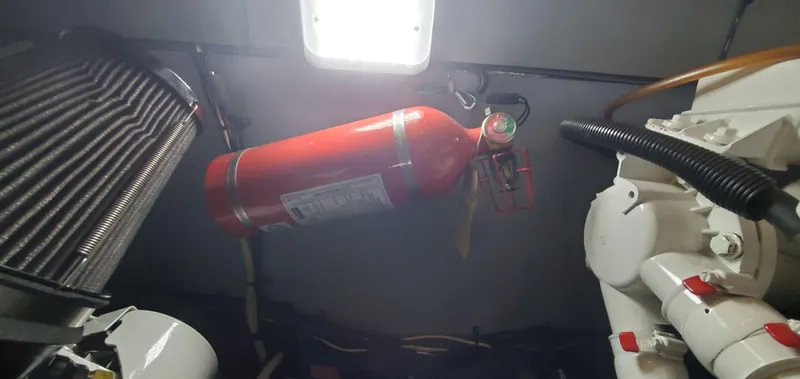 Callie B Yacht Photos Pics Fire extinguisher in 2001 Sea Ray 400 Sedan Bridge engine room.