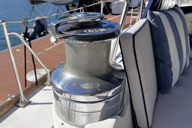 Unicorn Yacht Photos Pics Winch on 1988 Hylas Custom 44 yacht deck with striped cushions.