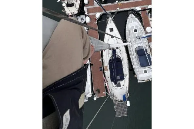 Unicorn Yacht Photos Pics Bird's-eye view of Hylas Custom 44 sailboats docked at a marina, 1988 model.