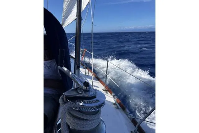 Unicorn Yacht Photos Pics Sailing on a 1988 Hylas Custom 44 yacht in open ocean waters.