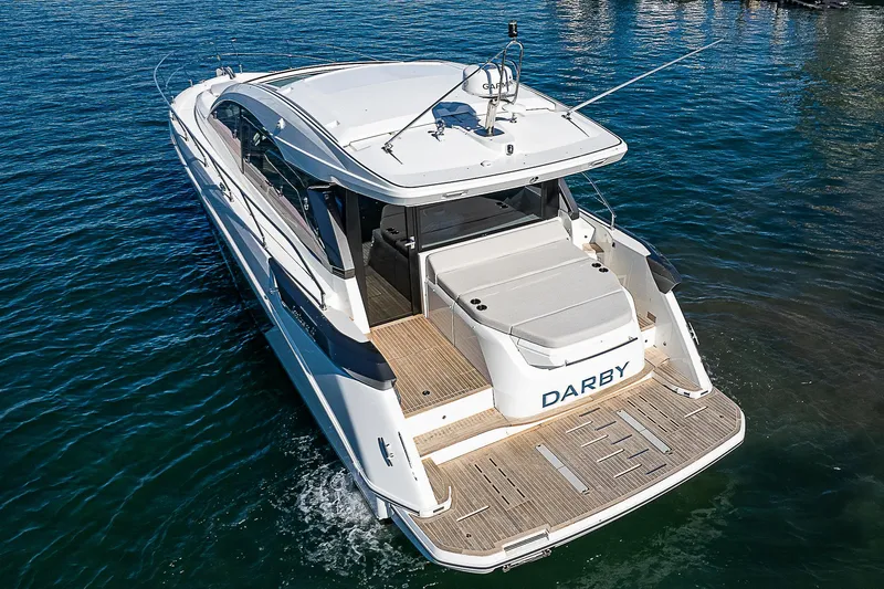 Beygu002f122 Yacht Photos Pics 2022 Beneteau Gran Turismo 45 yacht cruising on open water.