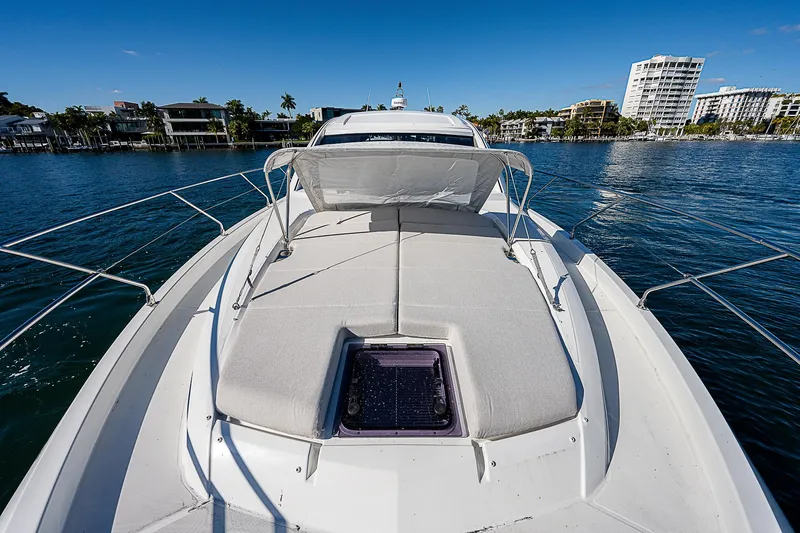 Beygu002f122 Yacht Photos Pics 2022 Beneteau Gran Turismo 45 yacht on calm water, sunny day.