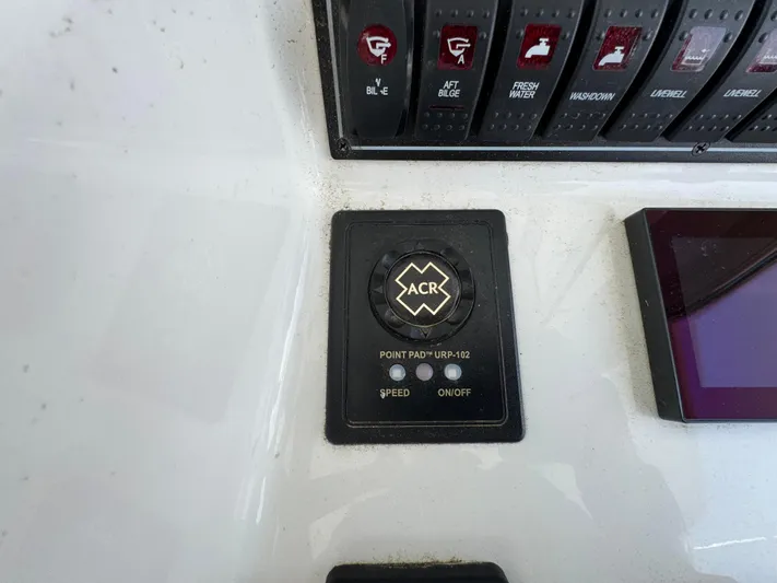  Yacht Photos Pics Control panel of 2022 Pursuit S 378 Sport boat with ACR point pad.