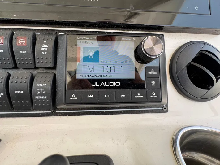  Yacht Photos Pics Control panel of a 2022 Pursuit S 378 Sport boat featuring JL Audio system.