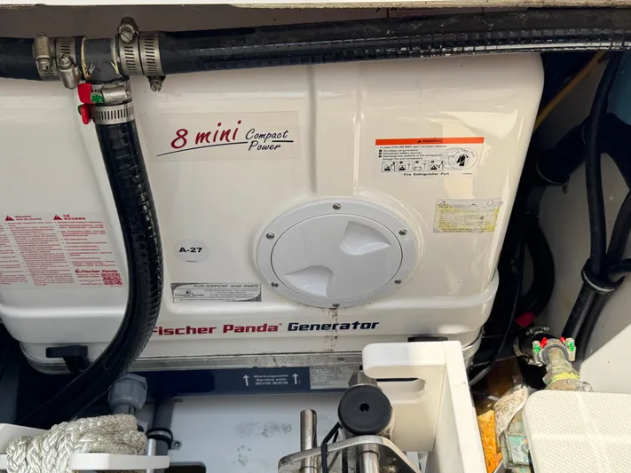  Yacht Photos Pics Fischer Panda generator in 2022 Pursuit S 378 Sport boat engine compartment.