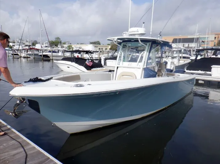  Yacht Photos Pics 2017 Sailfish 290 CC boat docked at marina.