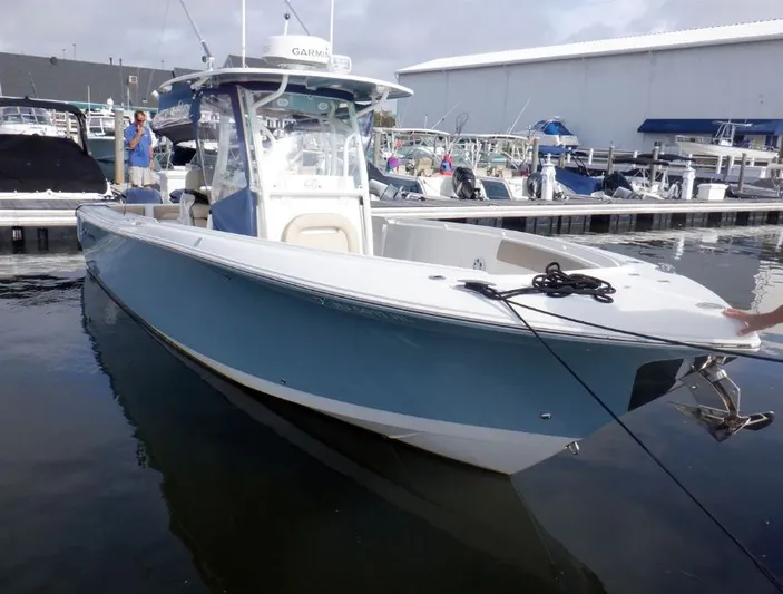  Yacht Photos Pics 2017 Sailfish 290 CC boat docked at marina.