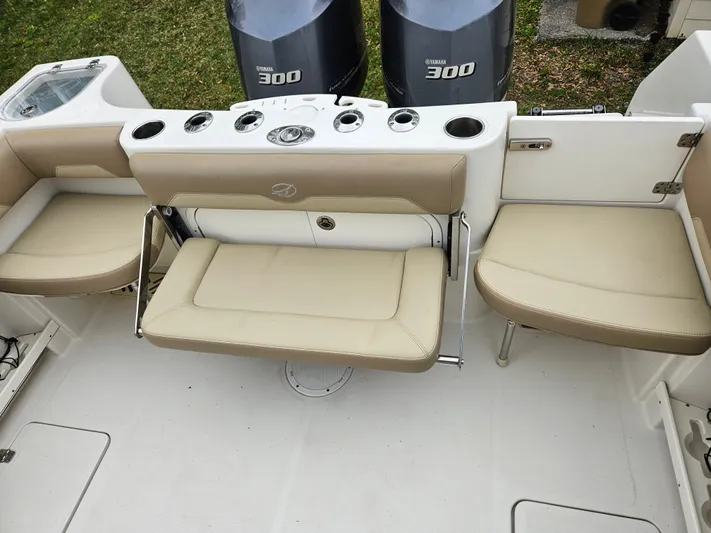  Yacht Photos Pics Sailfish 290 CC 2017 boat rear seating area with Yamaha 300 engines.