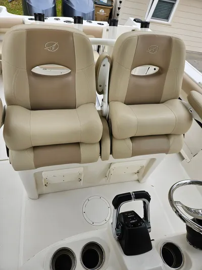  Yacht Photos Pics Sailfish 290 CC 2017 boat seats and helm console.