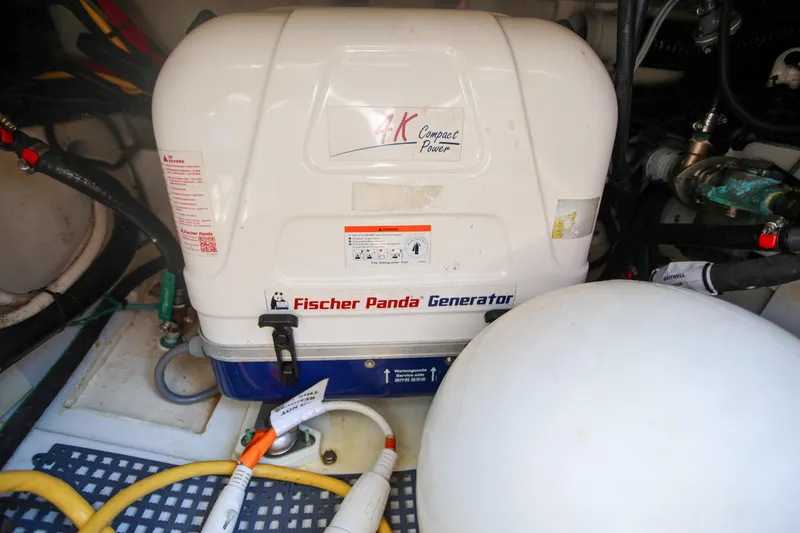  Yacht Photos Pics Fischer Panda generator in 2021 Pursuit OS 325 Offshore boat engine room.