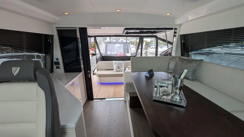 In Stock Yacht Photos Pics Luxurious interior of 2025 Fairline Targa 45 GT yacht with elegant seating and modern design.