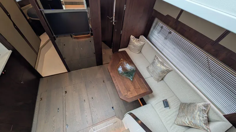 In Stock Yacht Photos Pics Luxurious interior of 2025 Fairline Targa 45 GT yacht with elegant seating and decor.