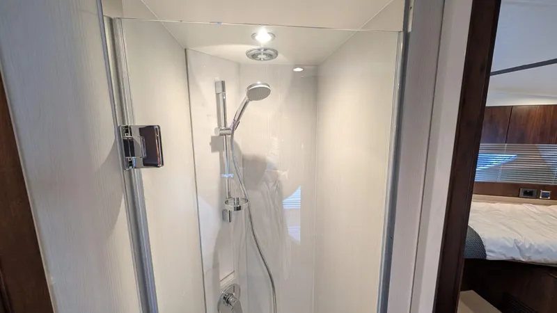 In Stock Yacht Photos Pics Modern shower in 2025 Fairline Targa 45 GT yacht cabin.