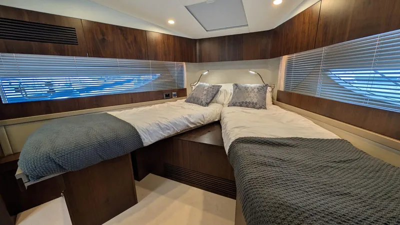 In Stock Yacht Photos Pics Luxurious cabin interior of 2025 Fairline Targa 45 GT yacht with twin beds.