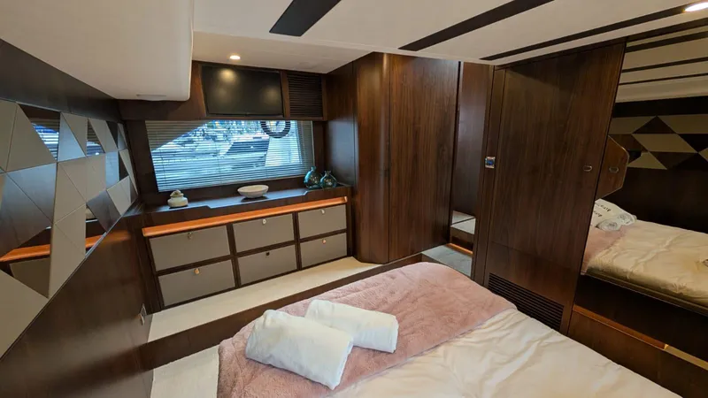 In Stock Yacht Photos Pics Luxurious cabin interior of 2025 Fairline Targa 45 GT yacht with modern wood finishes.