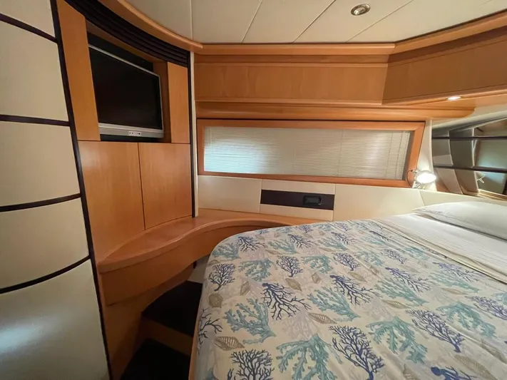  Yacht Photos Pics Luxurious cabin interior of a 2005 Pershing 76 yacht with modern amenities.