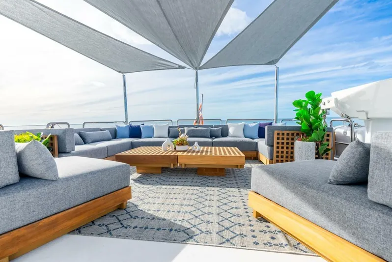 Simplicity Yacht Photos Pics Luxurious outdoor seating on 2012 Westport 112 yacht, featuring modern design and ocean views.