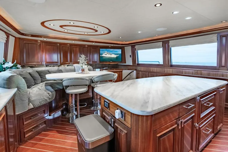 Simplicity Yacht Photos Pics Luxurious interior of 2012 Westport 112 yacht with elegant wood finishes and modern amenities.