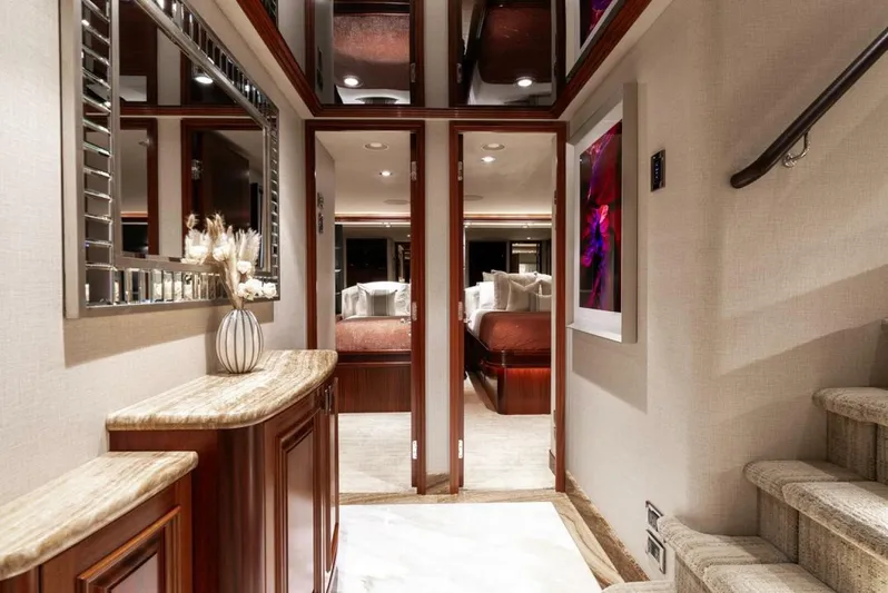 Simplicity Yacht Photos Pics Luxurious interior of 2012 Westport 112 yacht with elegant wood finishes and modern decor.