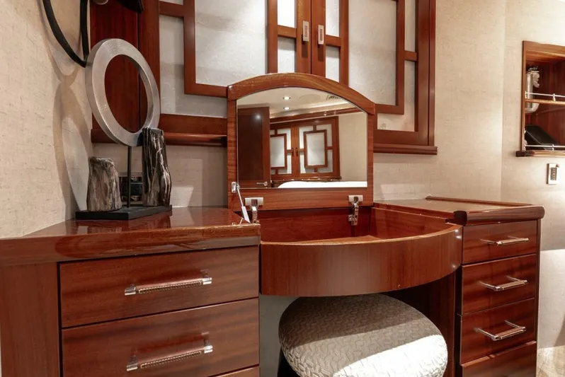 Simplicity Yacht Photos Pics Luxurious wooden vanity area in a 2012 Westport 112 yacht interior.