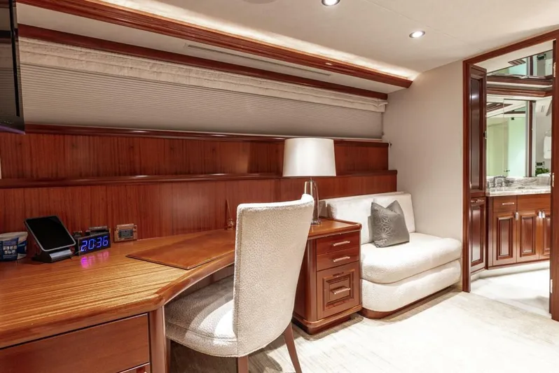 Simplicity Yacht Photos Pics Luxurious interior of 2012 Westport 112 yacht with elegant wood furnishings and cozy seating.