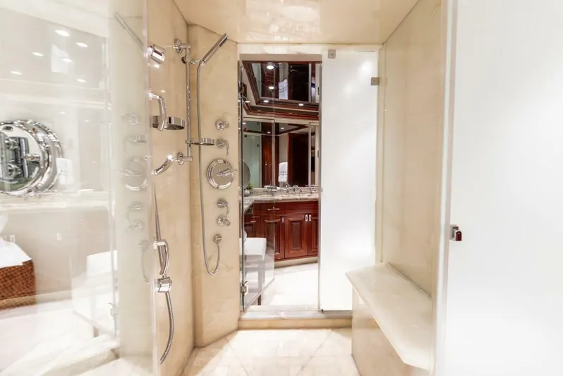 Simplicity Yacht Photos Pics Luxurious bathroom in 2012 Westport 112 yacht with modern shower and elegant fixtures.